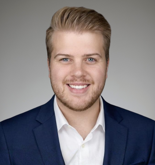 Smiling man in a suit headshot