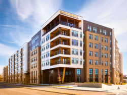 Modern multi-story apartment building with balconies